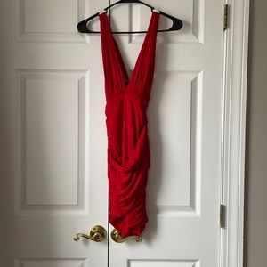 Red bodycon dress from Xenia boutique. Size 6. Worn once.